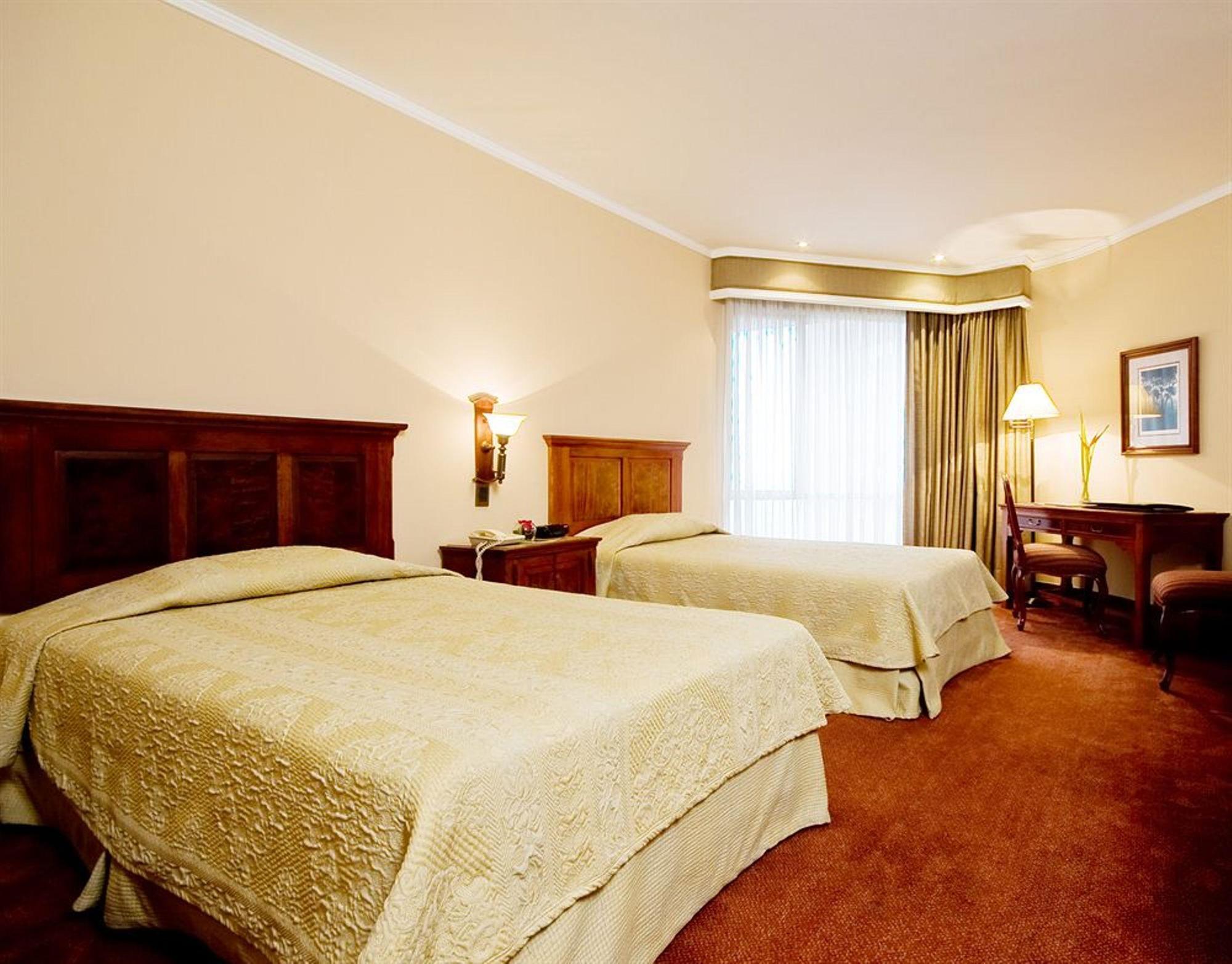 Hotel Dann Carlton Belfort Медельин Экстерьер фото A room at the hotel